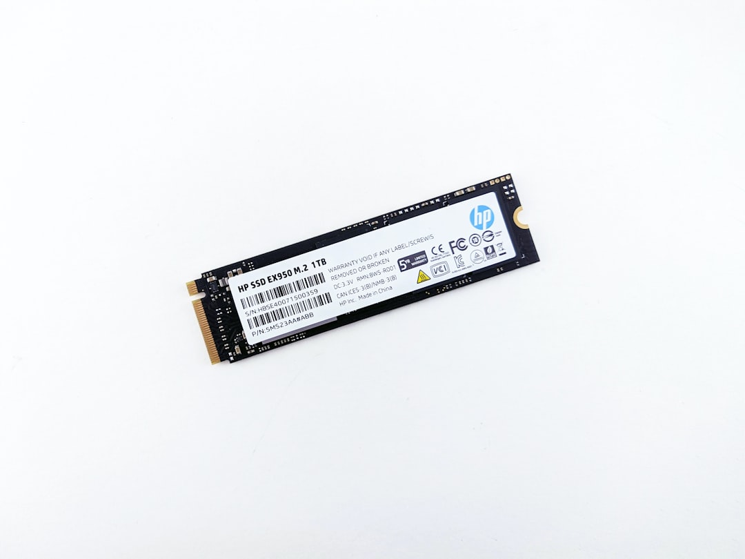 a close up of a memory card on a white surface