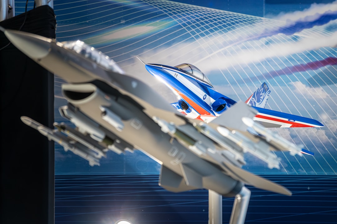 Model fighter jet with missiles displayed