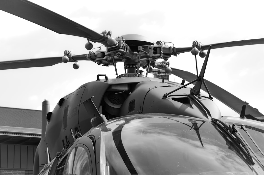 Close-up of a helicopter rotor and cockpit