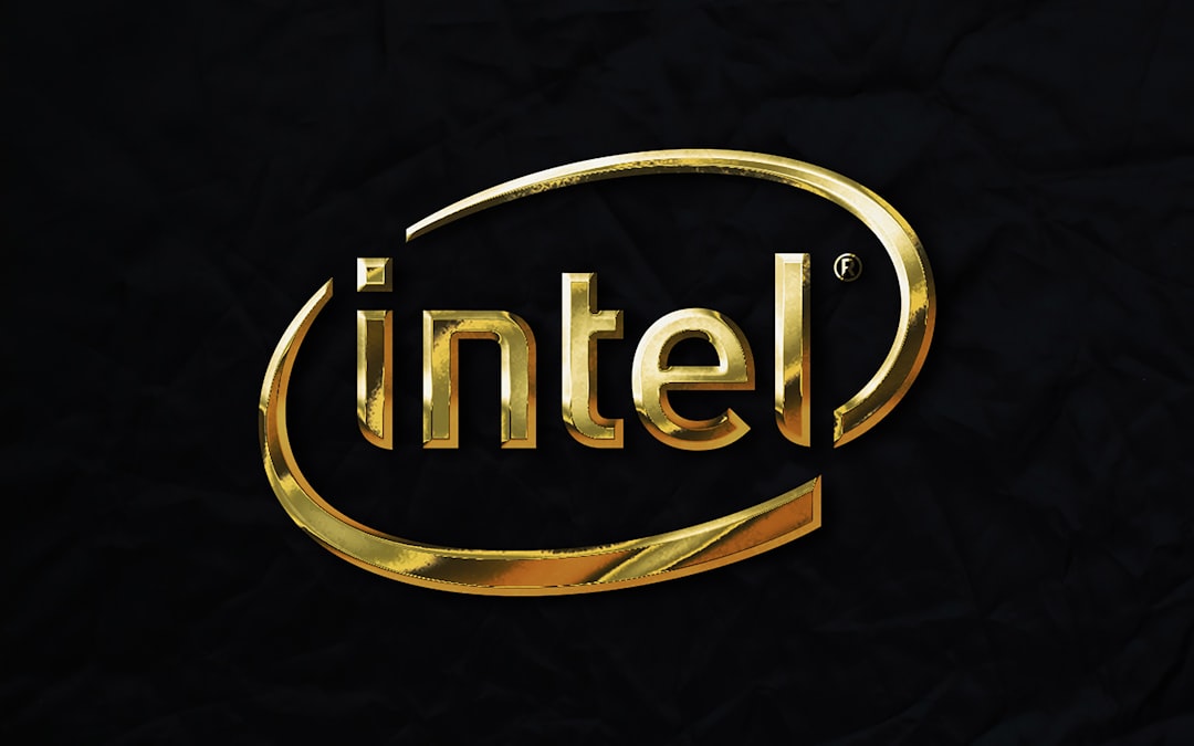 a gold intel logo on a black background