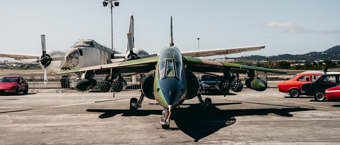A small plane sitting on top of an airport tarmac