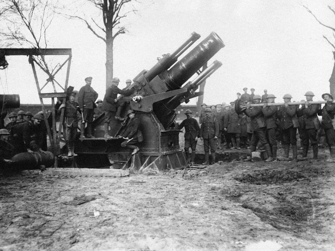 a group of men standing next to each other near a machine